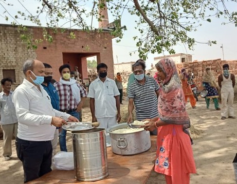 NLCIL offered relief materials and food to more than 200 poor people